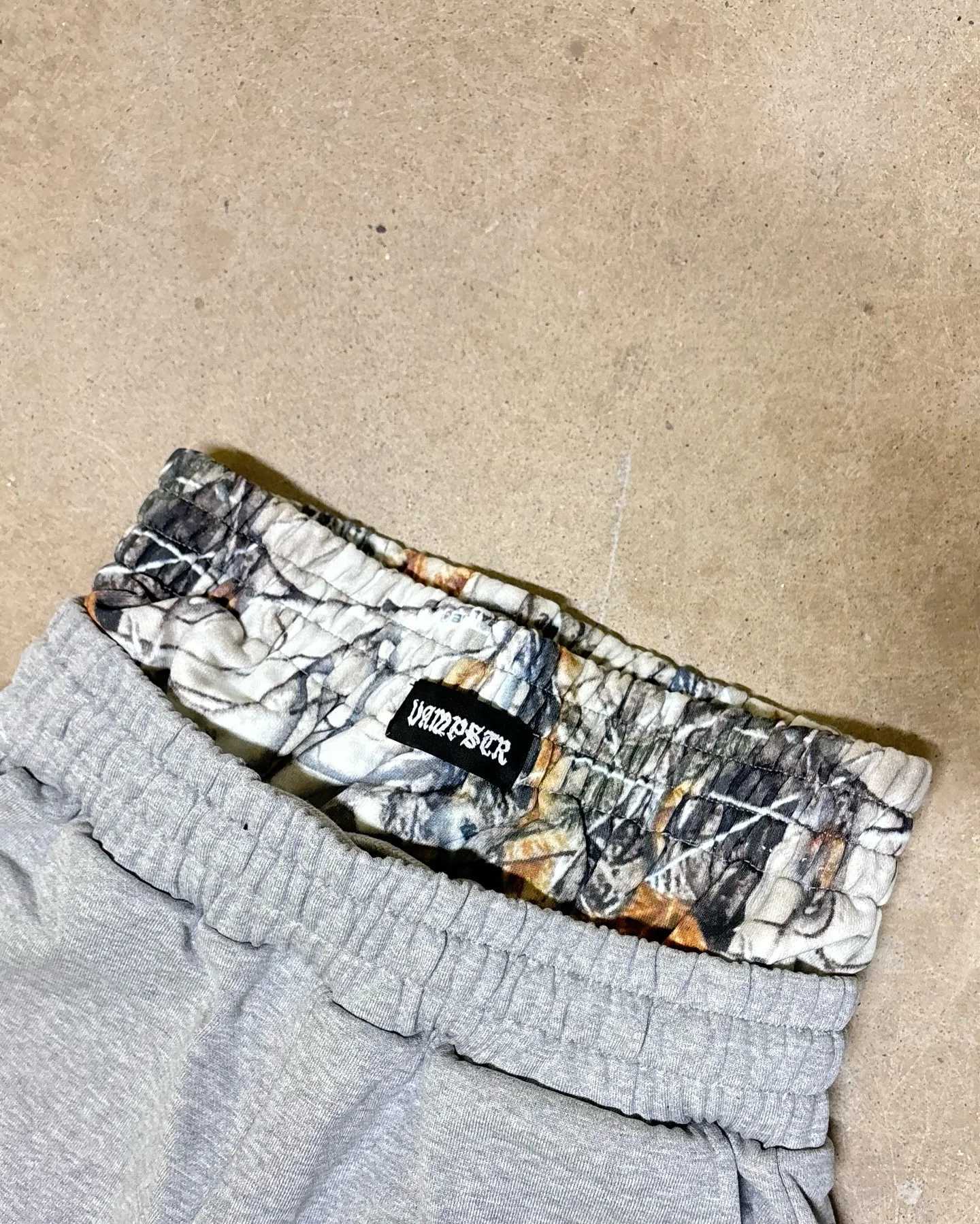 American mens and womens sports pants Y2K Gothic hip-hop retro double camouflage design loose elastic waist jogging casual pantsT250319