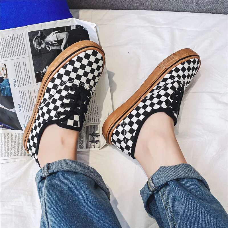 2025 Black And White Checkered Canvas Designer Shoes For Men Free Shipping Women S New Comfortable Couple Board Fashionable Niche High Quality Breatha
