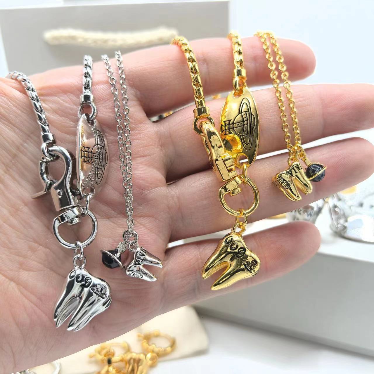 Designer Vivinnes Westwood Queen Dowager Wisdom Teeth Round Brand Necklace Bracelet Earrings Personalized Punk Style Elliptical Snake Bone Chain