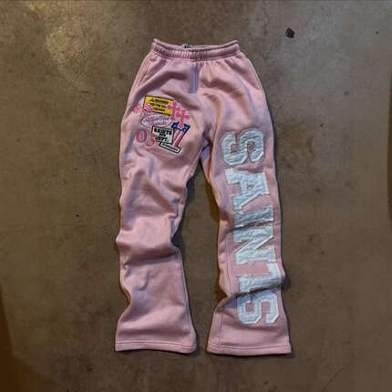 The new popular SAINTS series printed youth casual wide leg pants are selling well