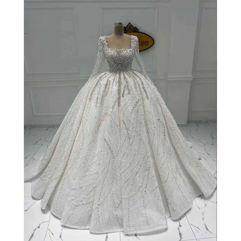 Exquisite beading dress graceful illusion long sleeve custom wedding dresses crystal pearls robe de