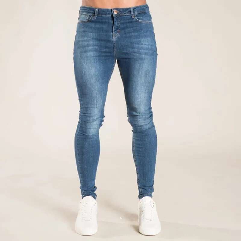 2025 Men s Elastic Tight Pants Solid Color Elastic Pencil Pants Street Wear Men s Blue Black Jeans Fashion Designer High Quality Cotton Jogging Outdoo