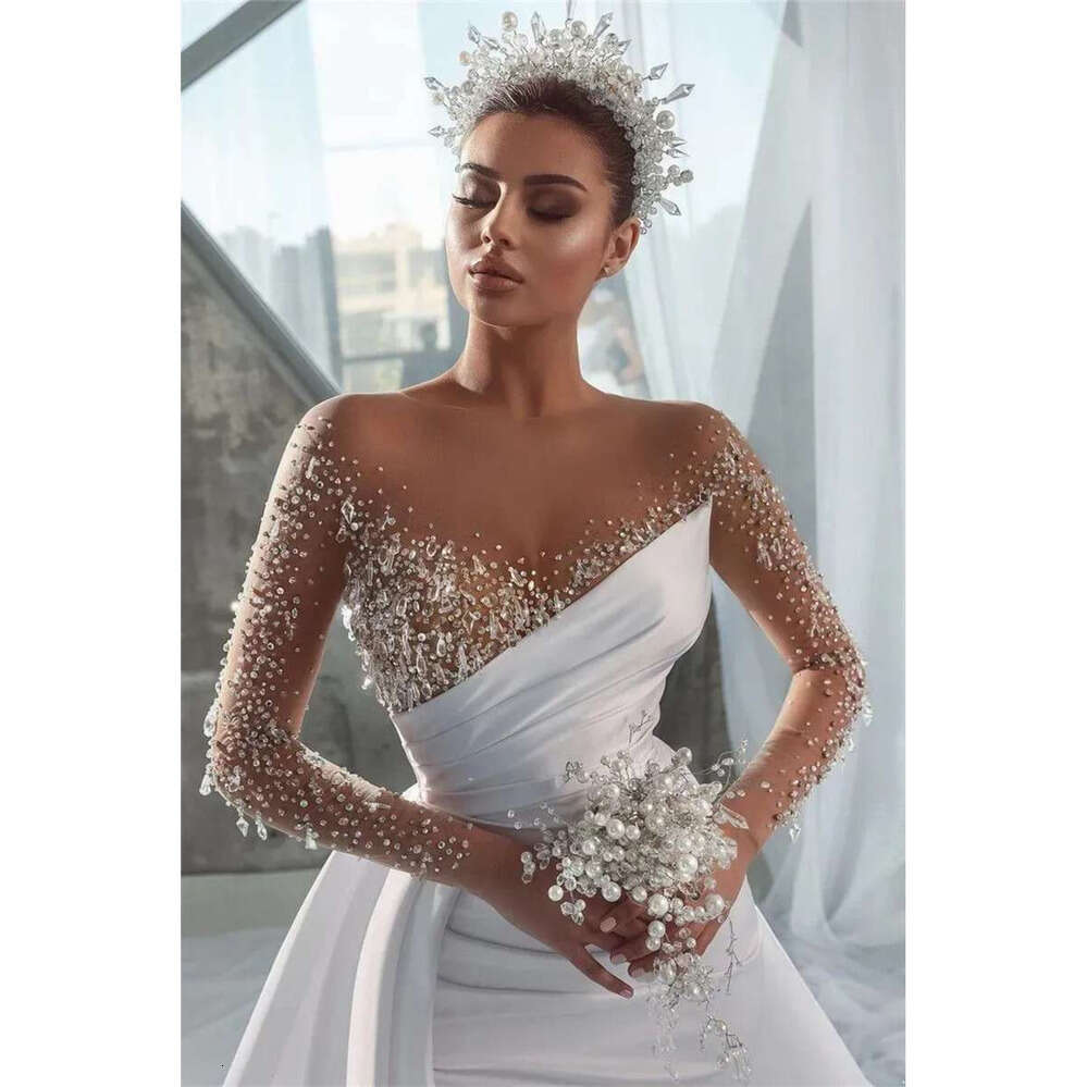Sexy Urious Beads Mermaid Wedding Dresses Sheer Long Sleeve Crystals Jewel Neck Arabic Dubai Bridal Gowns With Detachable Skirt BC