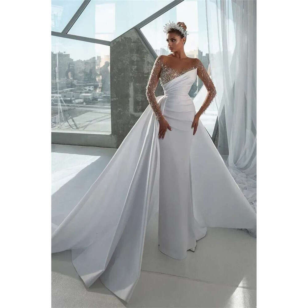 Sexy Urious Beads Mermaid Wedding Dresses Sheer Long Sleeve Crystals Jewel Neck Arabic Dubai Bridal Gowns With Detachable Skirt BC