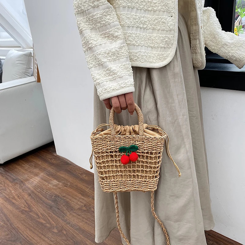 2024 summer new womens hand bag shoulder bag Environmental protection material advanced woven fashion cherry bow decoration R250311