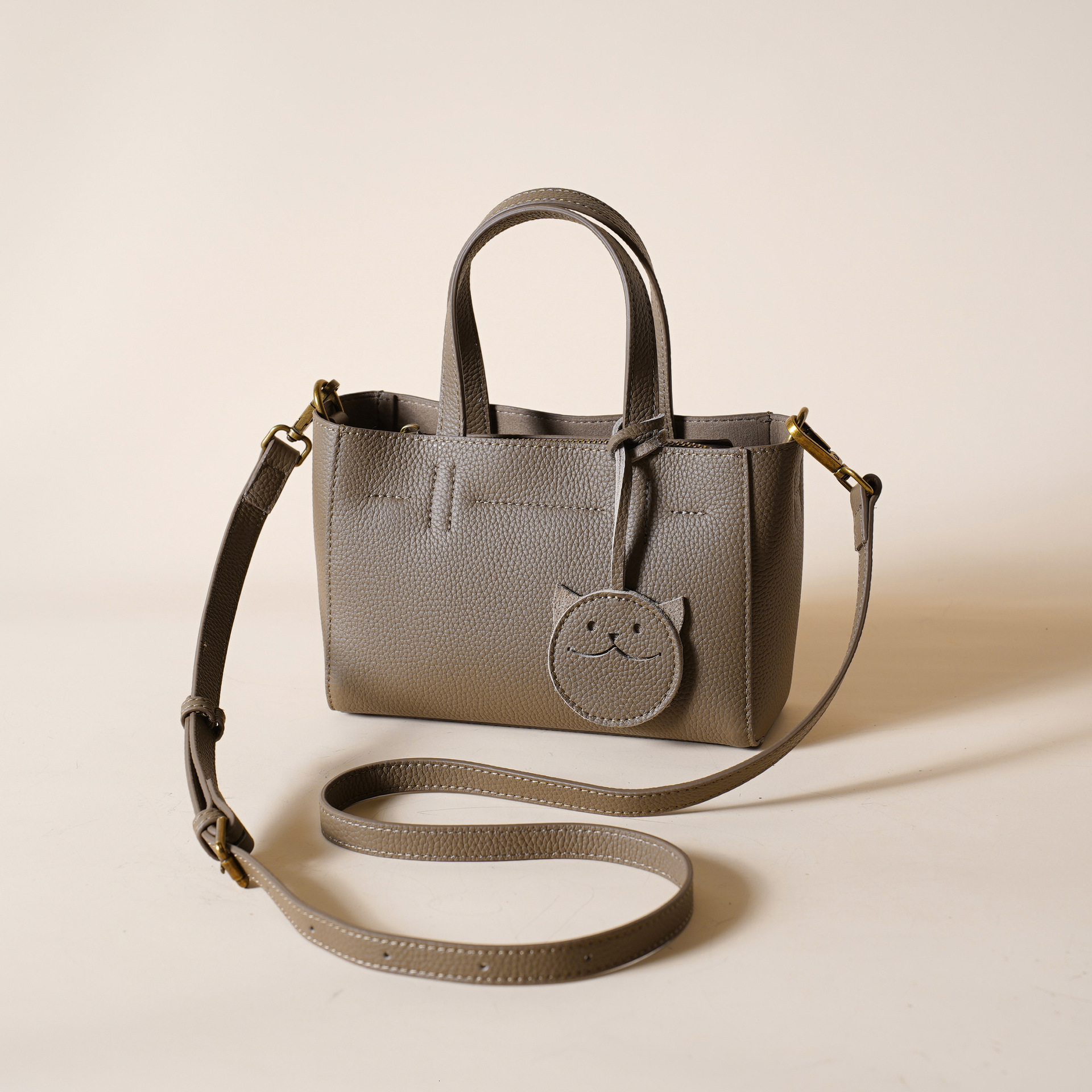 First Layer New Texture High-End Temperament Genuine Leather Women's Cowhide Smiling Face Hand-Held Shoulder Crossbody Bag