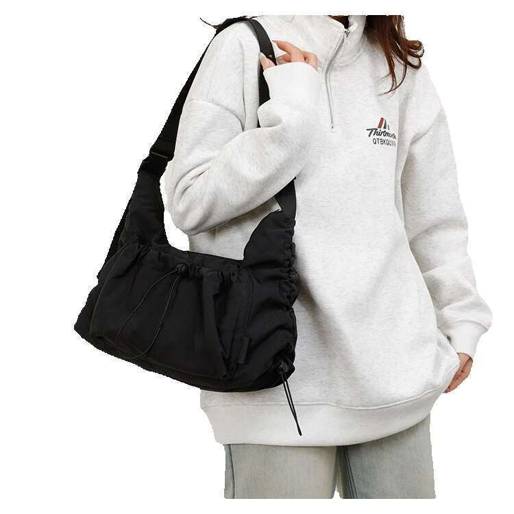 Spring nylon crossbody for both men women, lightweight and large capacity casual backpack, versatile commuting dumpling bag