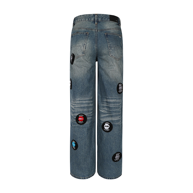 AM New Street Blue Splicing Embroidered Badge Small Foot Micro Elastic Men s Middle Waist Jeans Fashion Designer 2025 New Outdoor Casual Pants