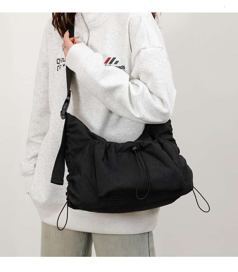 Spring nylon crossbody for both men women, lightweight and large capacity casual backpack, versatile commuting dumpling bag