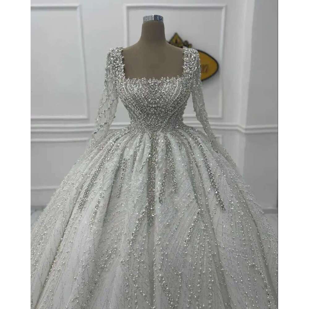 Exquisite beading dress graceful illusion long sleeve custom wedding dresses crystal pearls robe de