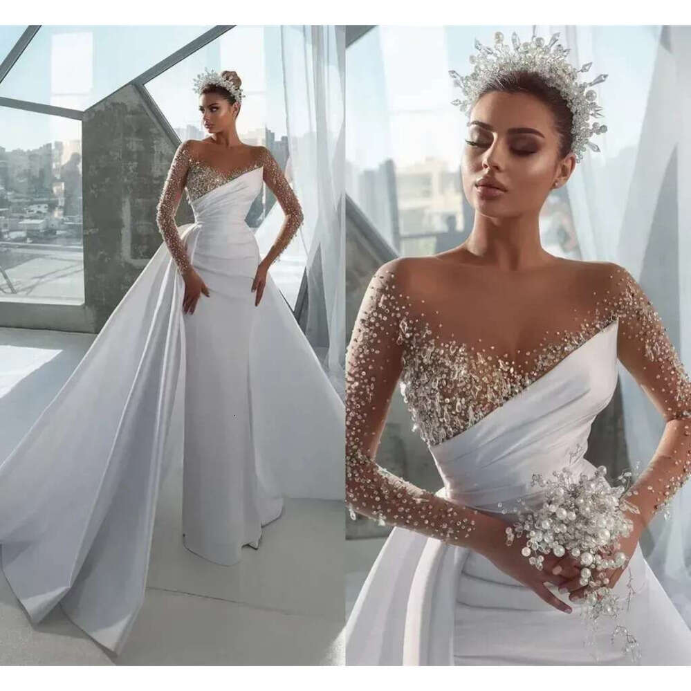 Sexy Urious Beads Mermaid Wedding Dresses Sheer Long Sleeve Crystals Jewel Neck Arabic Dubai Bridal Gowns With Detachable Skirt BC