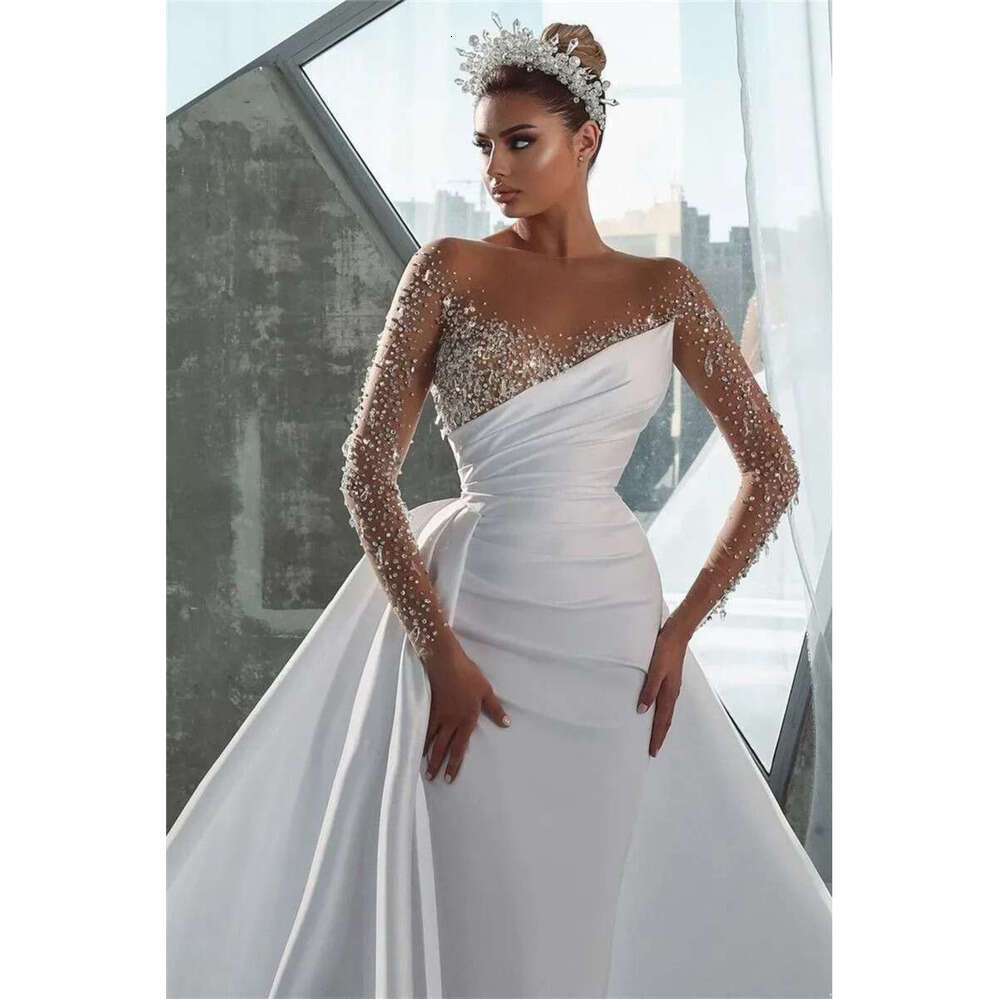 Sexy Urious Beads Mermaid Wedding Dresses Sheer Long Sleeve Crystals Jewel Neck Arabic Dubai Bridal Gowns With Detachable Skirt BC