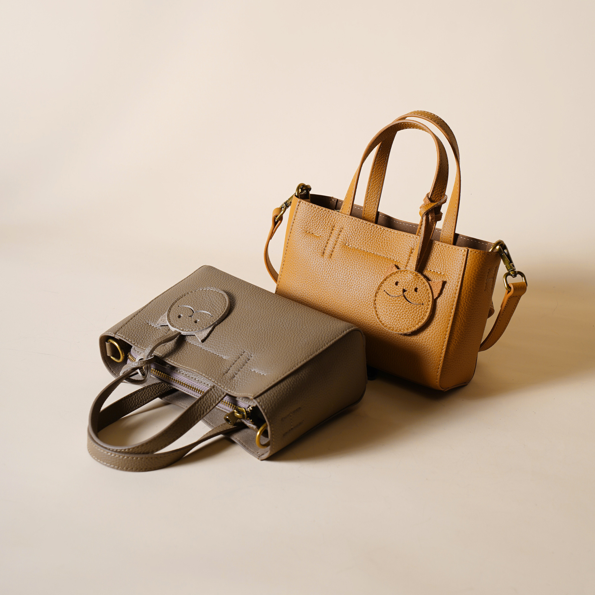 First Layer New Texture High-End Temperament Genuine Leather Women's Cowhide Smiling Face Hand-Held Shoulder Crossbody Bag