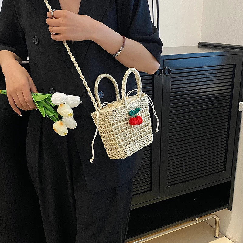2024 summer new womens hand bag shoulder bag Environmental protection material advanced woven fashion cherry bow decoration R250311