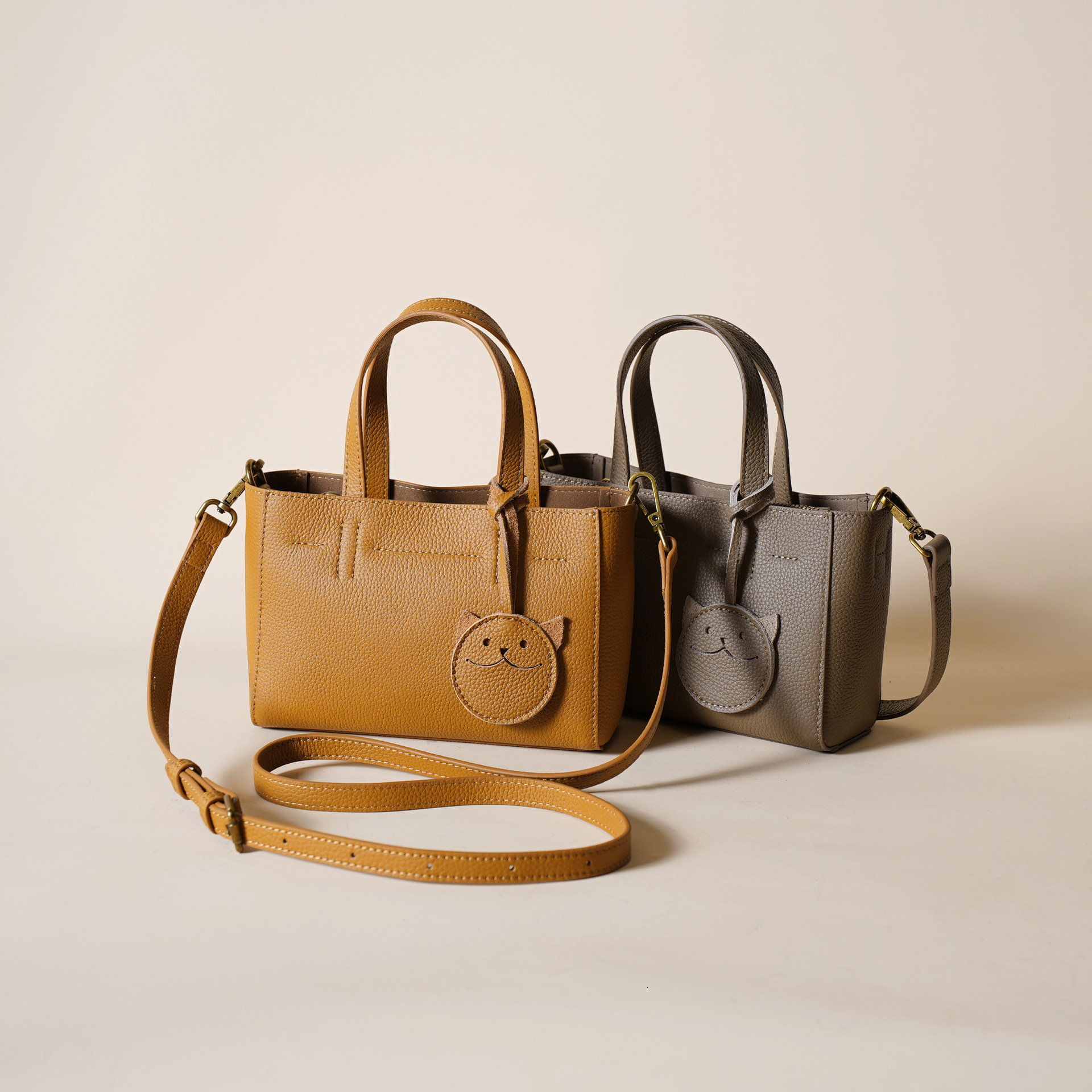 First Layer New Texture High-End Temperament Genuine Leather Women's Cowhide Smiling Face Hand-Held Shoulder Crossbody Bag