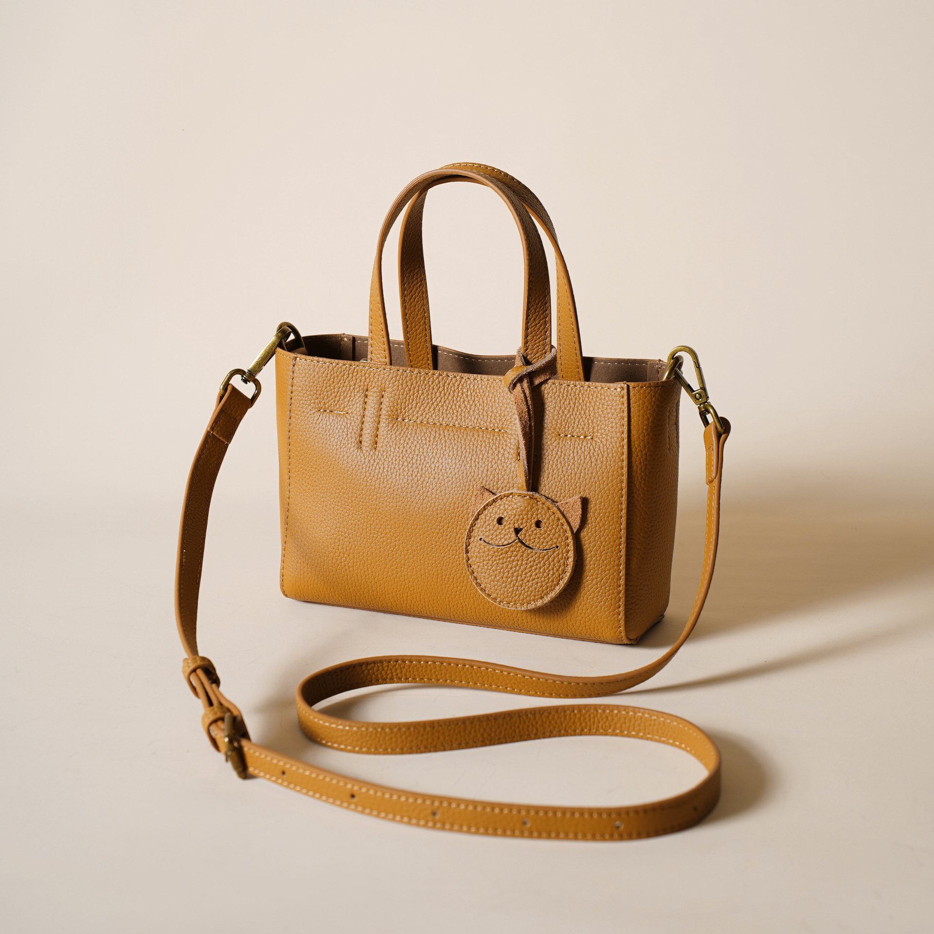 First Layer New Texture High-End Temperament Genuine Leather Women's Cowhide Smiling Face Hand-Held Shoulder Crossbody Bag