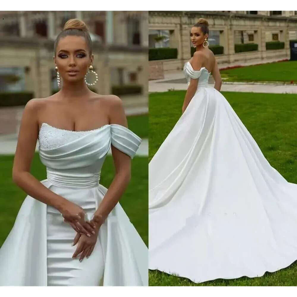 Arabic Stunning ASO EBI Dubai White Ivory Wedding Dresses Sexy Mermaid Off Shoulder Backless Sequins Beads Pleats Ruffles Long Bridal Gowns Robes BC