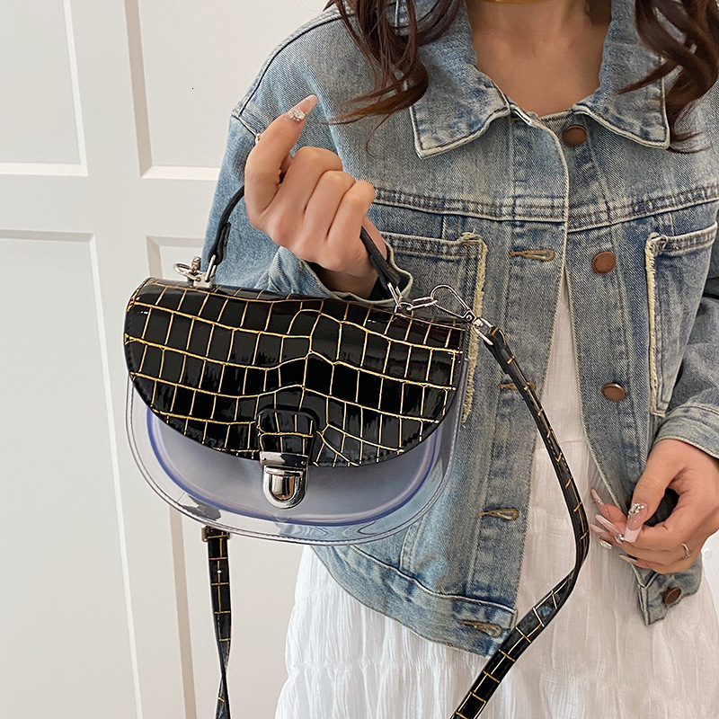 PU Women's 2025 New Korean Edition Fashion Stone Pattern Shoulder Instagram Internet Celebrity Handheld Transparent Crossbody Saddle Bag