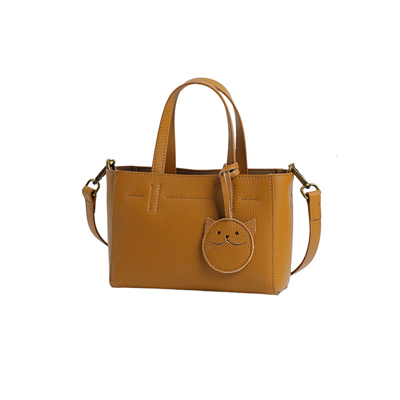 First Layer New Texture High-End Temperament Genuine Leather Women's Cowhide Smiling Face Hand-Held Shoulder Crossbody Bag