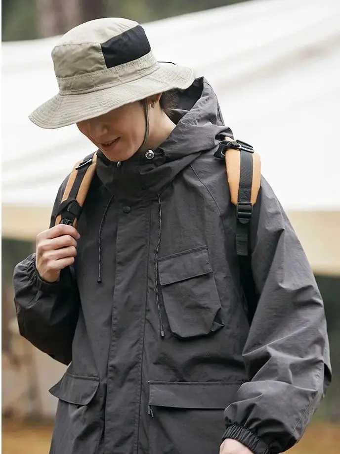Outdoor Mountaineering Skiing Windproof Waterproof Pocket Punching Jacket Coat Men Women Couple Hooded Jacket Soft WarmT250311