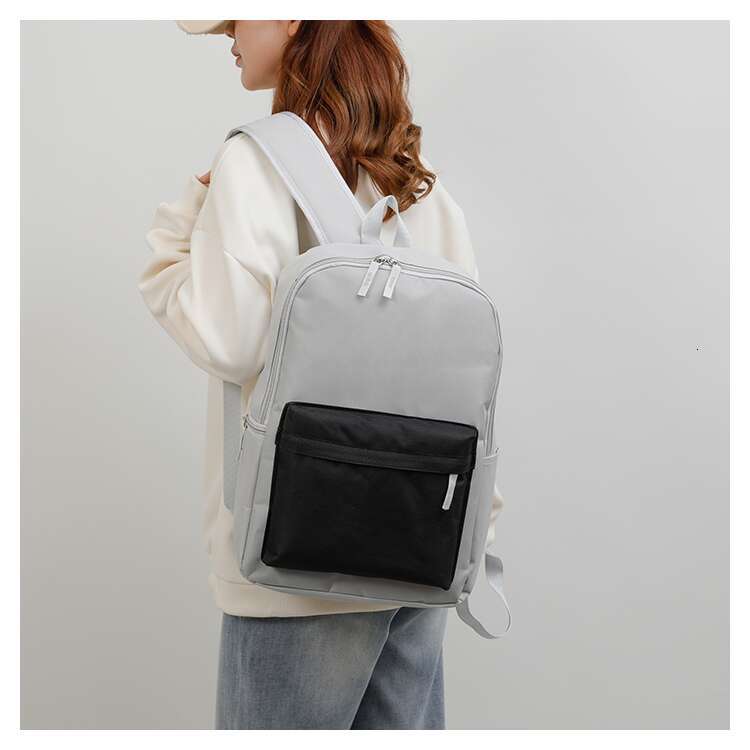New minimalist and versatile casual college student contrasting backpack, travel bag, sports backpack, trendy brand