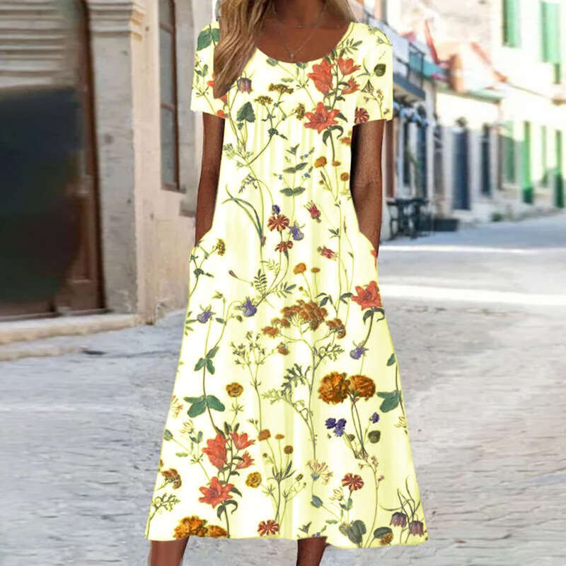 Factory direct sales of loose comfortable short sleeved printed dresses women's bohemian long dresses, with a versatile and trendy new style for 