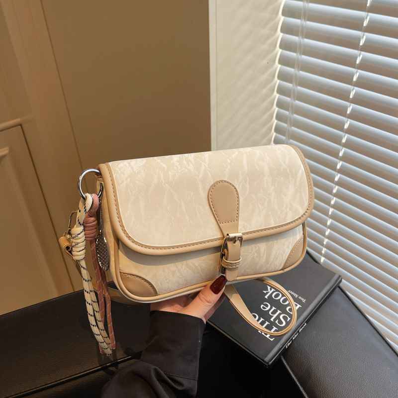 Korean fashion trend shoulder 2025 new simple casual niche design feeling underarm women's crossbody bag