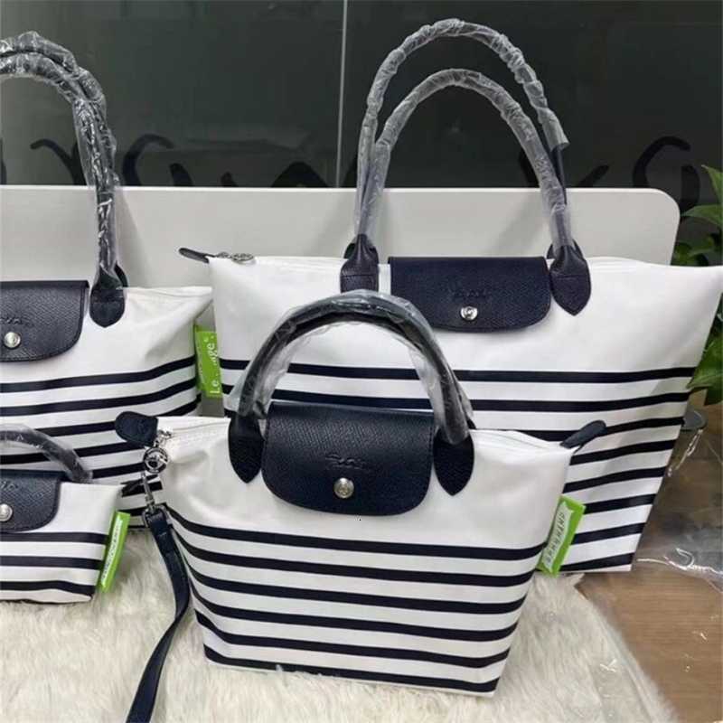Durable Travel Duffel Bag Stripe Style Striped Bun High quality designer luxury Dumpling White Blue bags Tote Large Navy Casual and versatile
