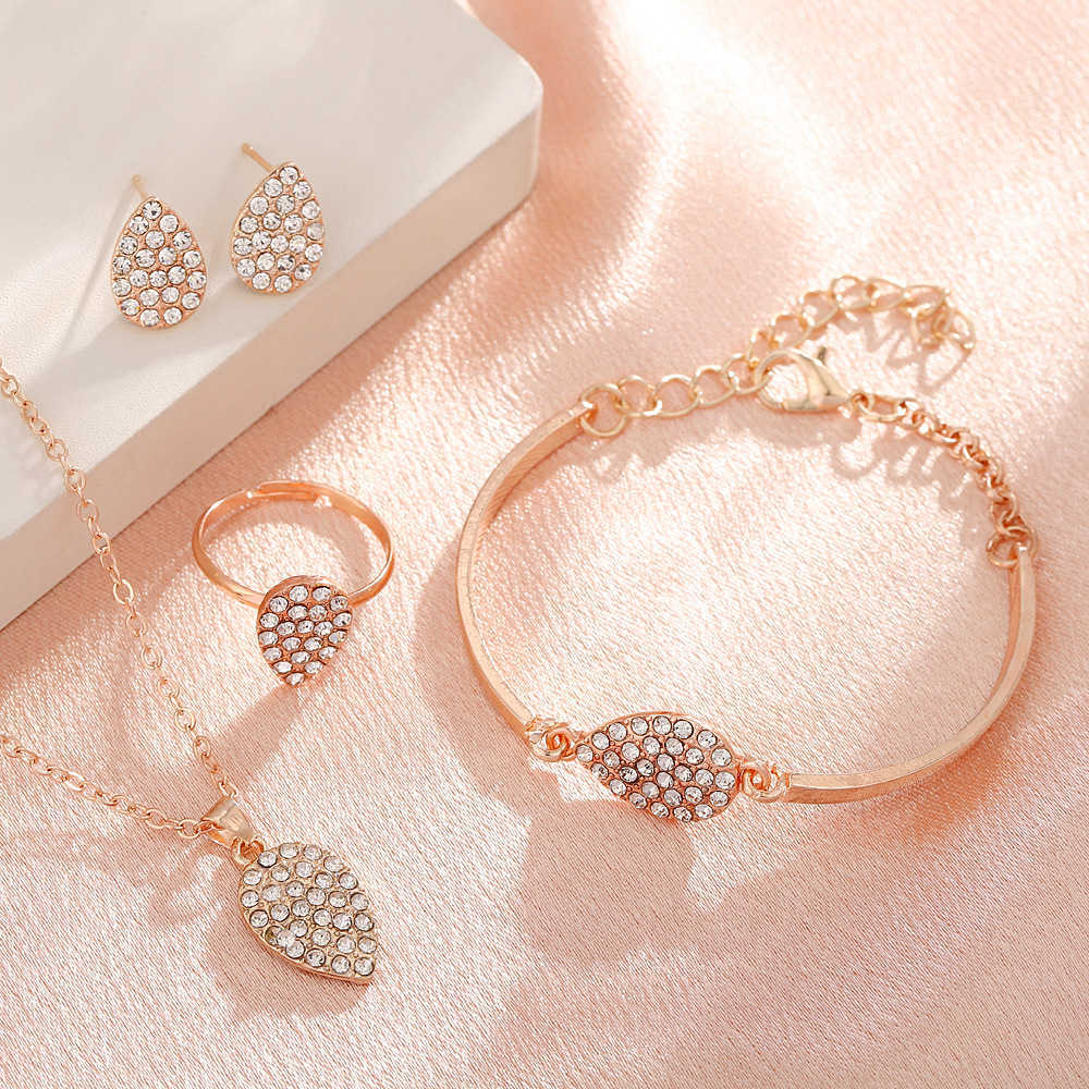 Jewelry set for women with a high-end feel diamond studded water droplet pendant necklace fashionable and versatile bracelet earrings W250312