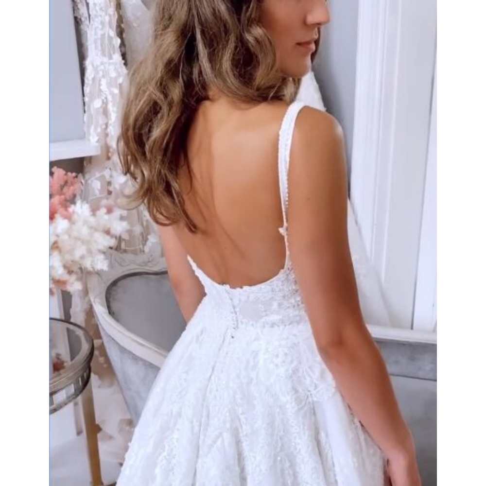 Front Slit Boho Wedding Dresses Lace Appliques Spaghetti Straps Backless Sexy A-Line Bridal Gown 2025 Sleeveless Court Train Beach Bride Dress