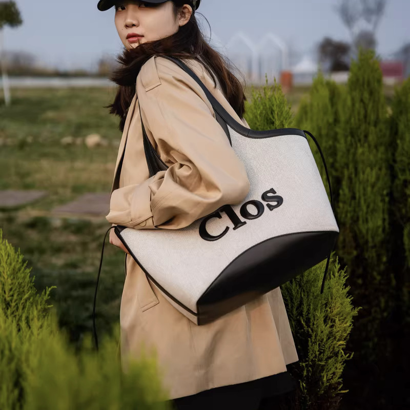 2025 Spring summer High Quality Canvas Handbag Fashion Designer Trendy Large Capacity Crossbody Bag Commuter Outdoor Leisure Women s Underarm Bag Stor