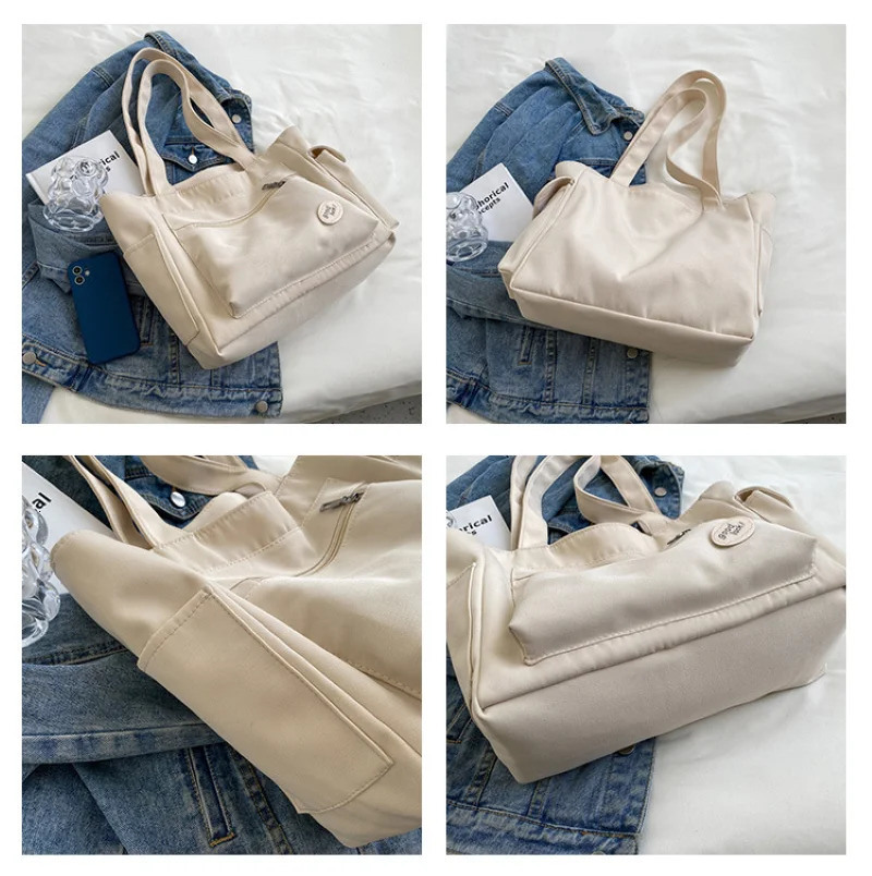 Womens bag fashionable large capacity student Oxford canvas handbag Mom casual shopping armpit multifunctional 250304