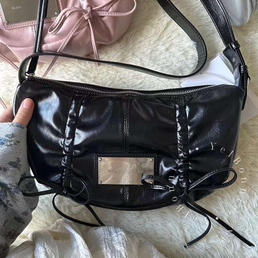 2025 Korean Niche Mini Handheld Bag Metal Tag Bow Drawstring Shoulder Bag Fashion Designer Handbag Popular Wallet Crossbody Bag New Trend
