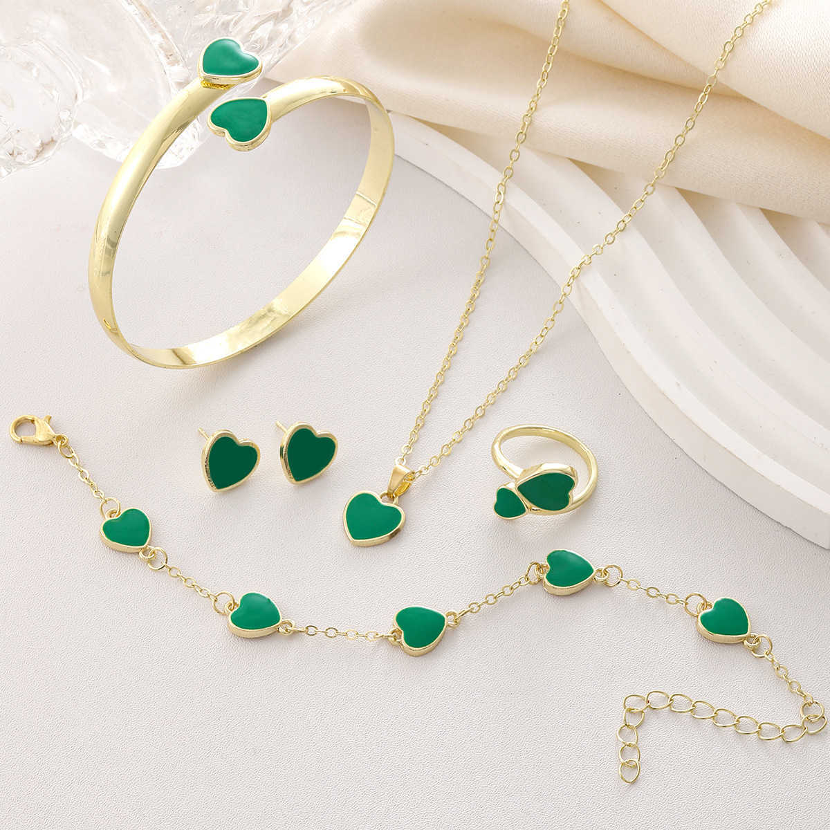 Hot selling Love Jewelry Set Xiyin Peach Heart Bracelet Bracelet Earnail Necklace Ring Jewelry W250312