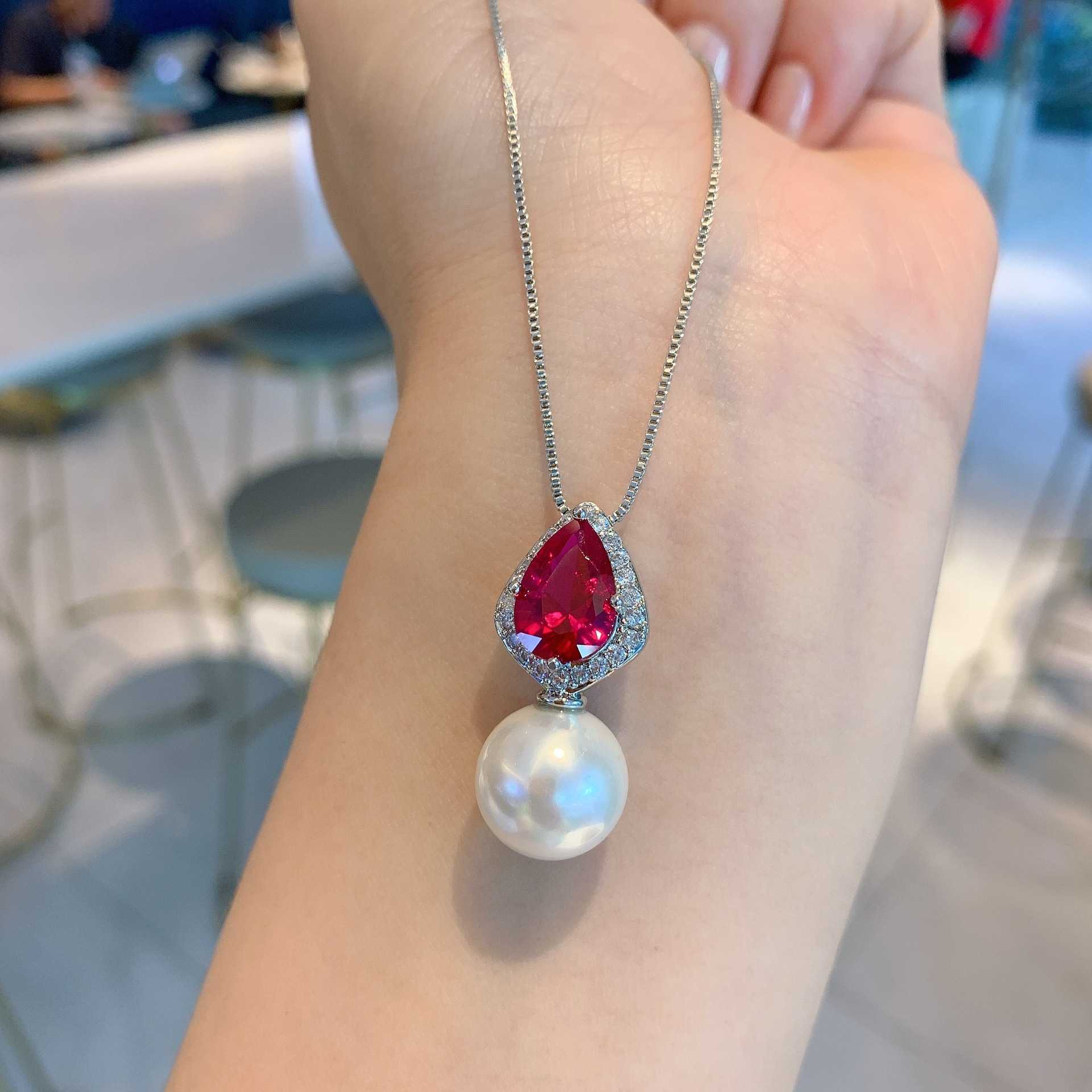 New set of white pearl jewelry red corundum pear shaped necklace earrings white pearl high-end fashion womens batch W250312