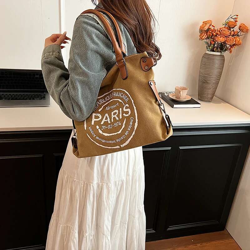 New Portable Canvas Fashion Women's Letters Large Capacity Tote Bag Leisure Commuting Single Shoulder Diagonal Span