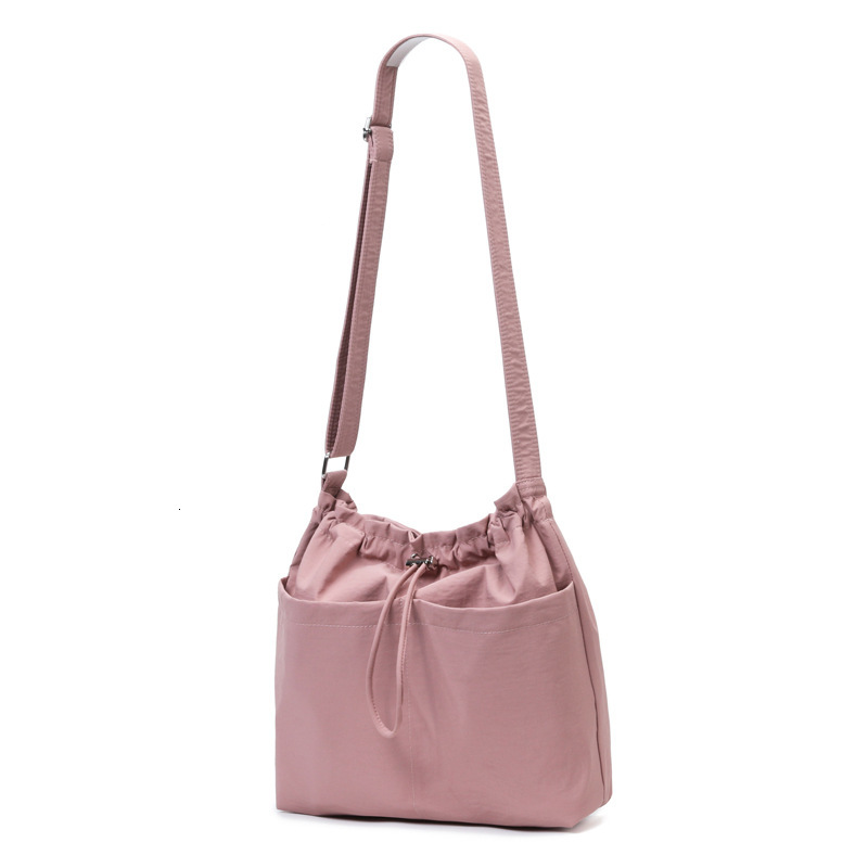 Flat Solid Color Drawstring Leisure Bag 2025 New Fashion Designer Popular High quality Handbag Commuting Shoulder Bag