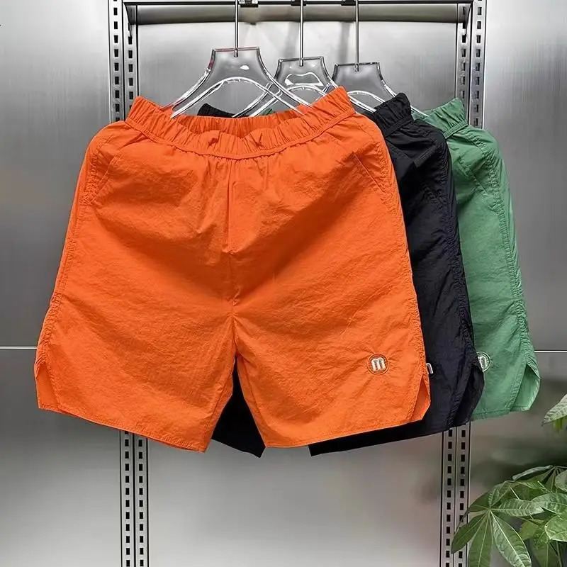 Mens Japanese style solid color ice slider sports casual shorts fashion loose top fast drying beach five point pants 250312