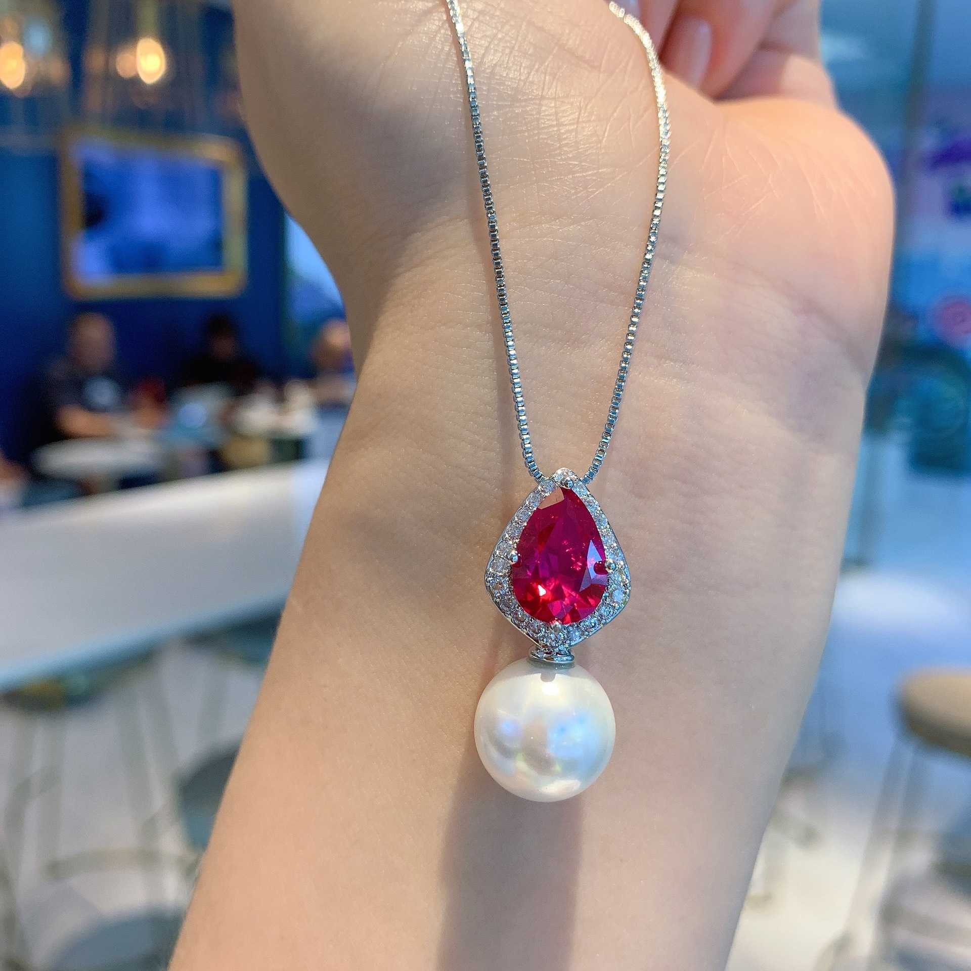 New set of white pearl jewelry red corundum pear shaped necklace earrings white pearl high-end fashion womens batch W250312