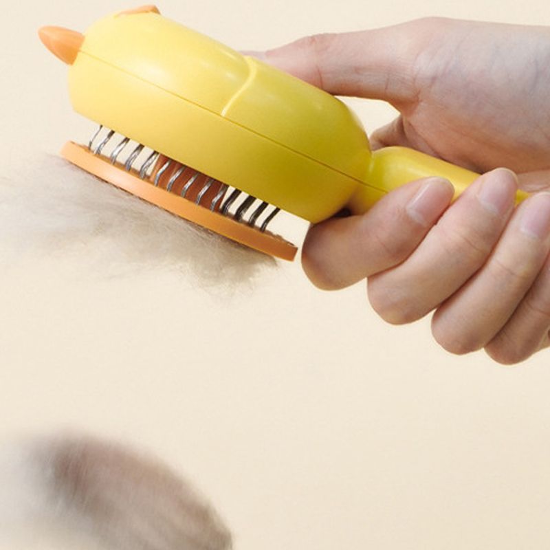 Cute cartoon chick pet cleaning comb ABS stainless steel material massage comfortable one button push hair curved comb teeth morefunpet