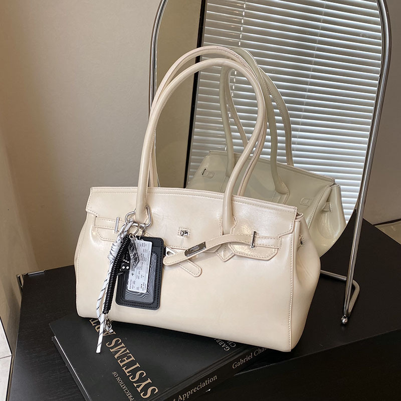 Spring 2025 Fashion Luxury Niche Designer High-end Leather Women s Handbag Simple Style Large Capacity Storage Bag Casual Crossbody Bag Wallet