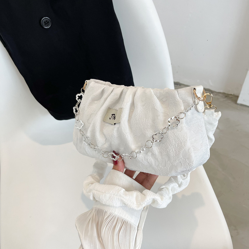 Small Niche Designer Fashion Mini Handbag 2025 New Women s Crossbody Bag Summer Chain Style Single Shoulder Armpit Bag Makeup Storage Bag