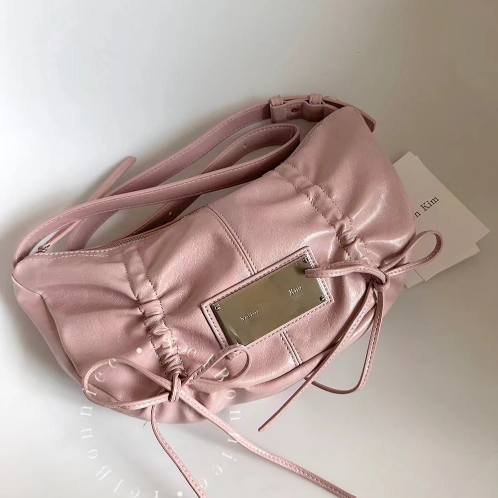 2025 Korean Niche Mini Handheld Bag Metal Tag Bow Drawstring Shoulder Bag Fashion Designer Handbag Popular Wallet Crossbody Bag New Trend