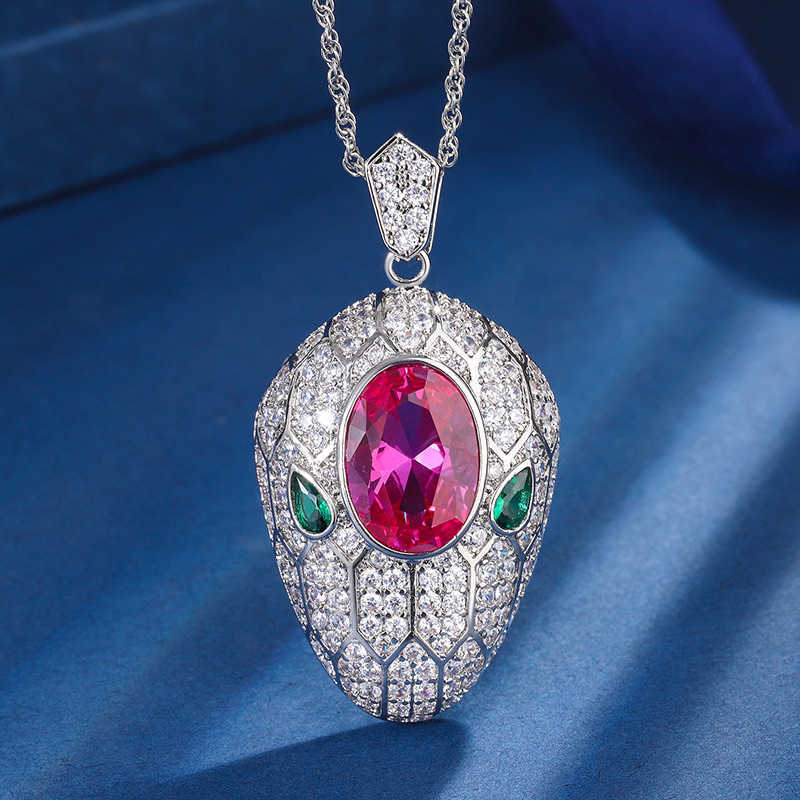 Zhuang Shengshengs new copper bottom gold-plated simulation rose red corundum light luxury snake head set pendant ring 10 * 14 W250312