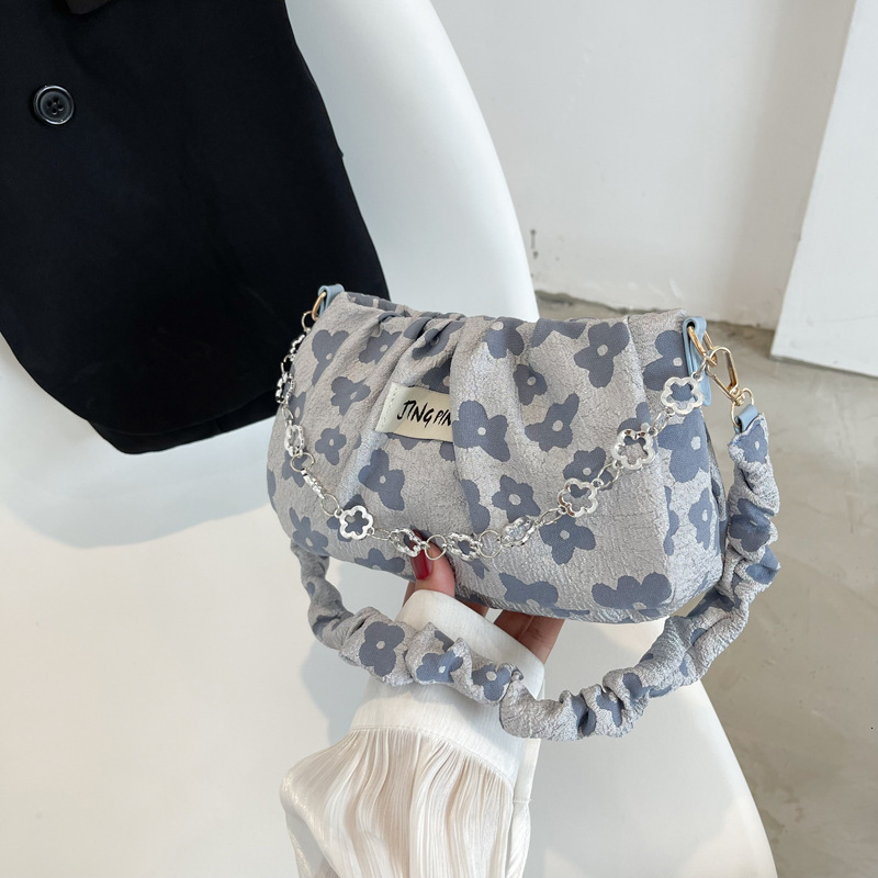 Small Niche Designer Fashion Mini Handbag 2025 New Women s Crossbody Bag Summer Chain Style Single Shoulder Armpit Bag Makeup Storage Bag