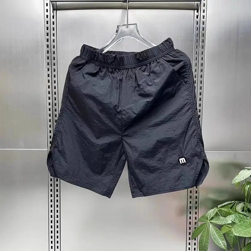 Mens Japanese style solid color ice slider sports casual shorts fashion loose top fast drying beach five point pants 250312