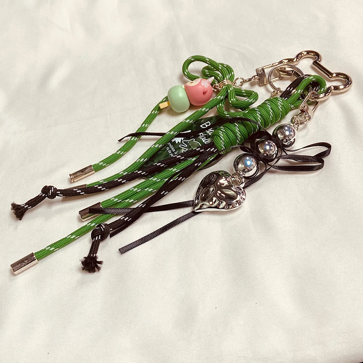 Bag pendant cartoon bag buckle retro rope bracelet bow love versatile bag accessories keychain gift 250311