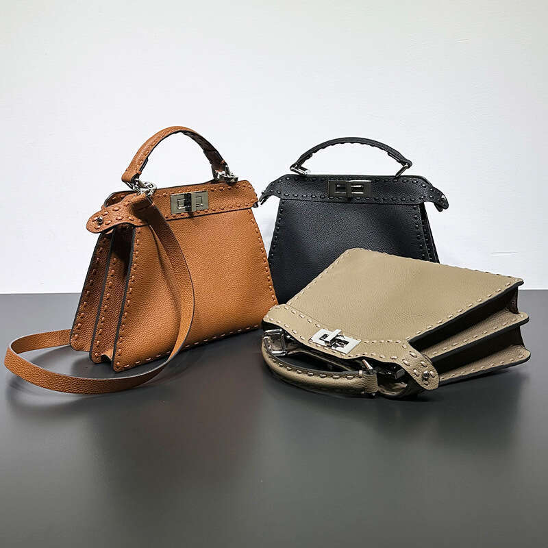 2023 New Peekaboo Fashion High End Knitted Kitten Bag, Shoulder Cross Carrying Organ Leather Bag For Women