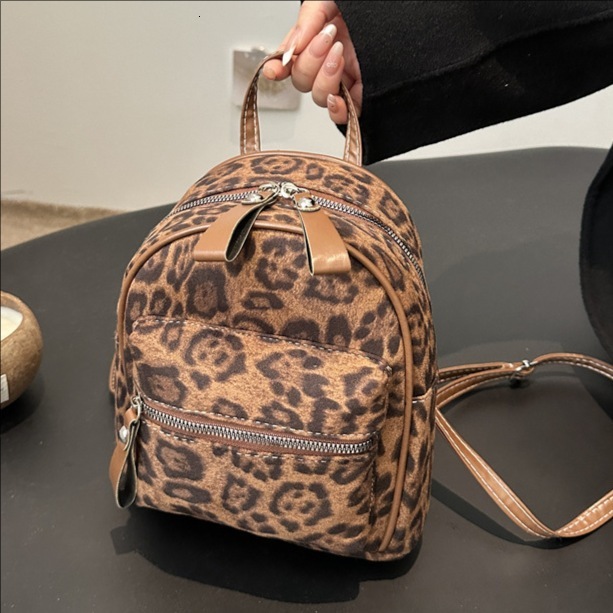 Women s 2025 Summer New Leopard Pattern Fashion Designer Trendy Backpack Multi Functional Handheld Travel Backpack Outdoor Leisure Handbag Wallet Stor