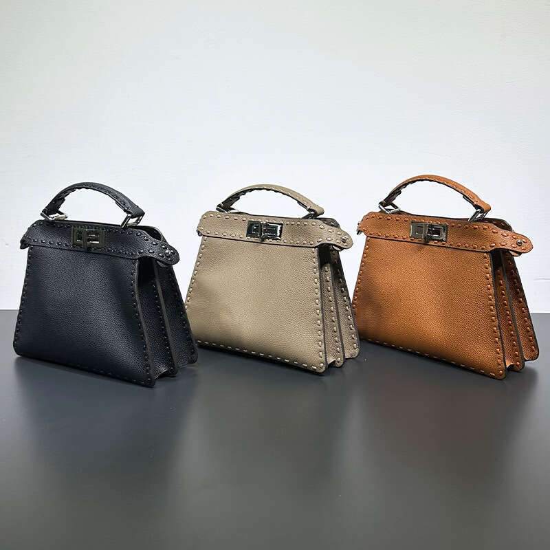 2023 New Peekaboo Fashion High End Knitted Kitten Bag, Shoulder Cross Carrying Organ Leather Bag For Women